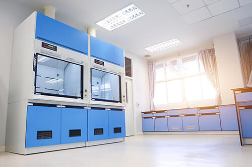 a laboratory with fume hoods